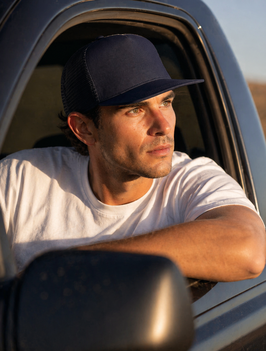 Navy blue as trucker cap with solid front panel and mesh back perfect for workwear and work uniforms