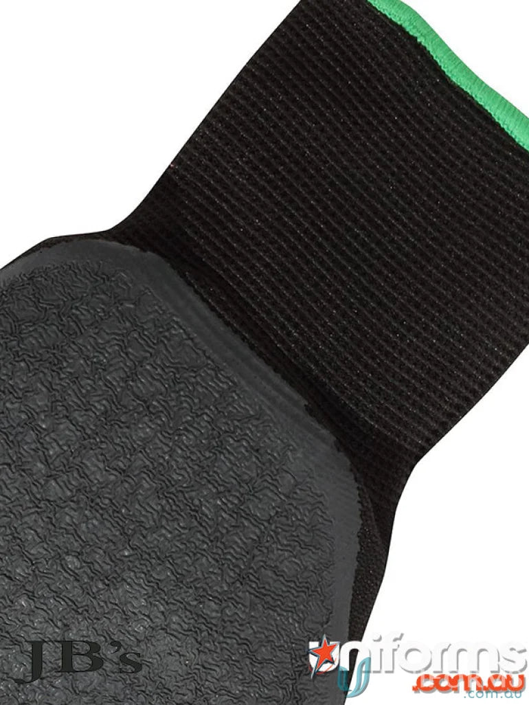 Black knee pad with green trim for general purpose workwear and uniforms