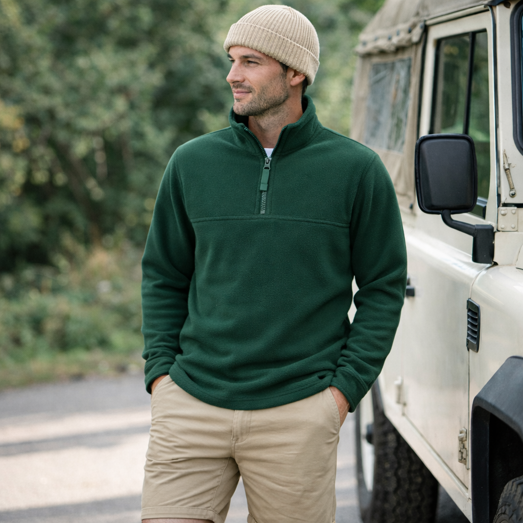 Dark green PolarTech half zip polar jumper with ribbed collar keeps you warm