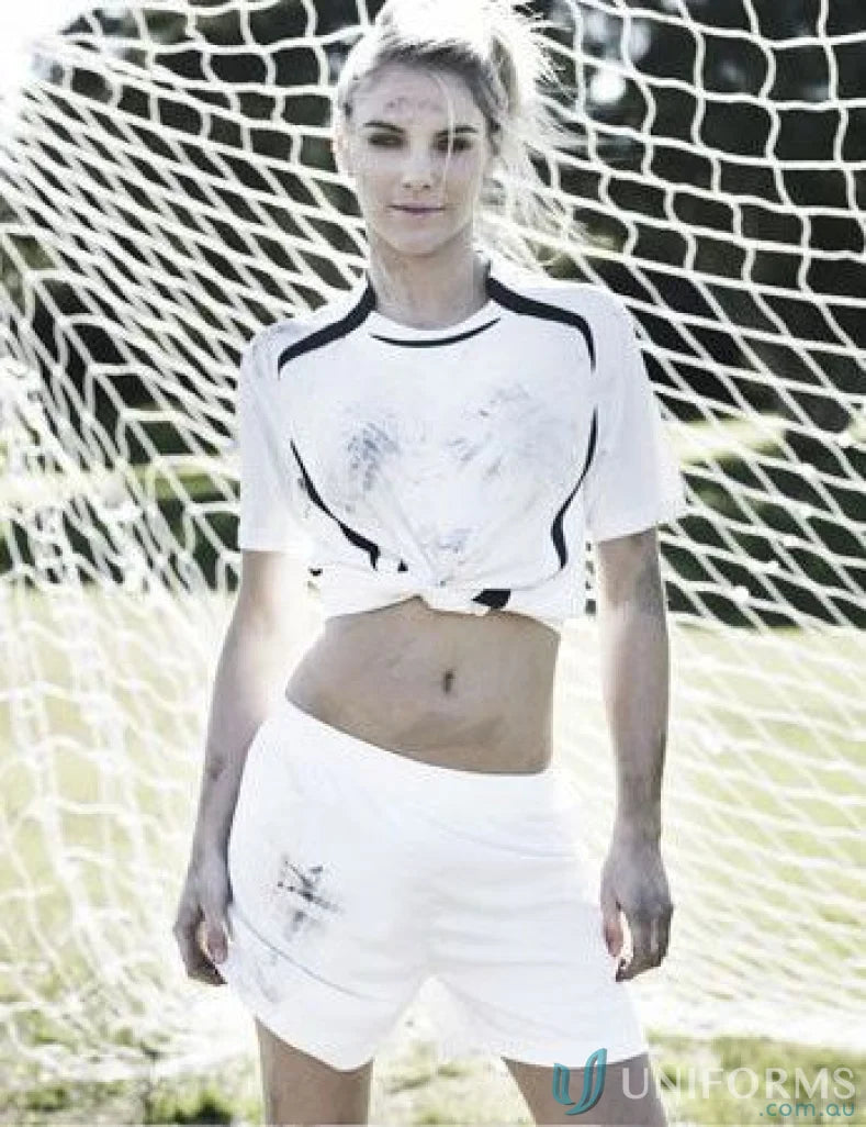 Woman in a sporty soccer jersey showcasing adult performance sports uniforms workwear