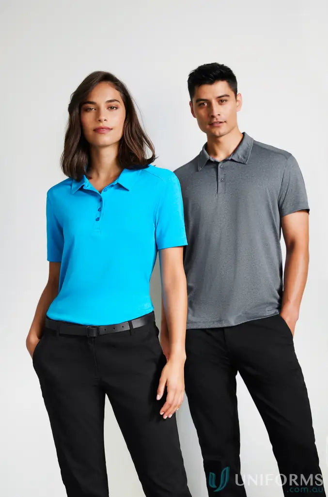 Two people in stylish Aero Polo shirts and black pants from Biz Collection Aero