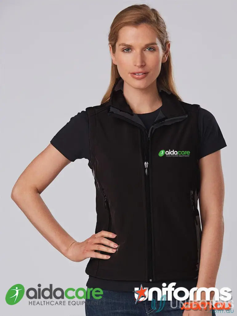 Black softshell vest from Aidacare EMBx1 perfect for work uniforms and casual wear
