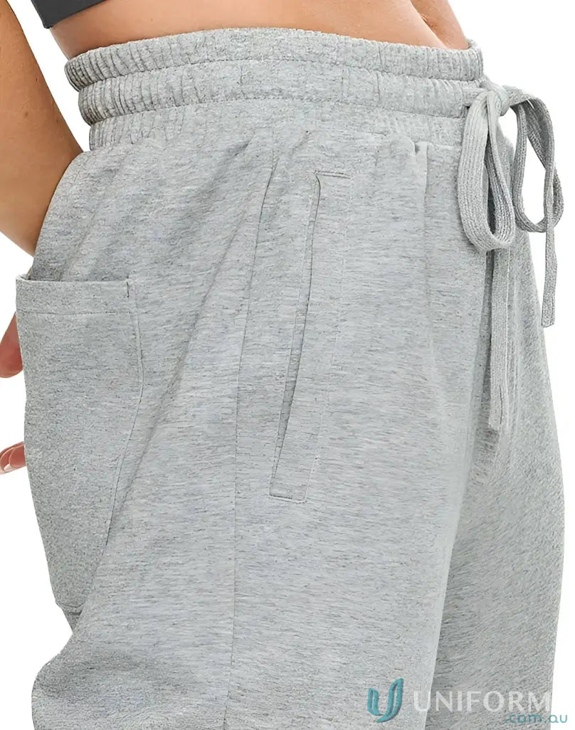 Gray heathered airlayed cvc sweatpants with elastic waistband and side pockets perfect for workwear uniforms