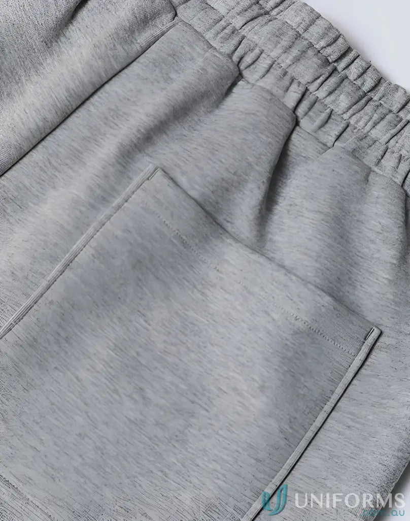 Gray heathered airlayed cvc sweatpants with soft textured fabric and elastic waistband ideal for workwear uniforms