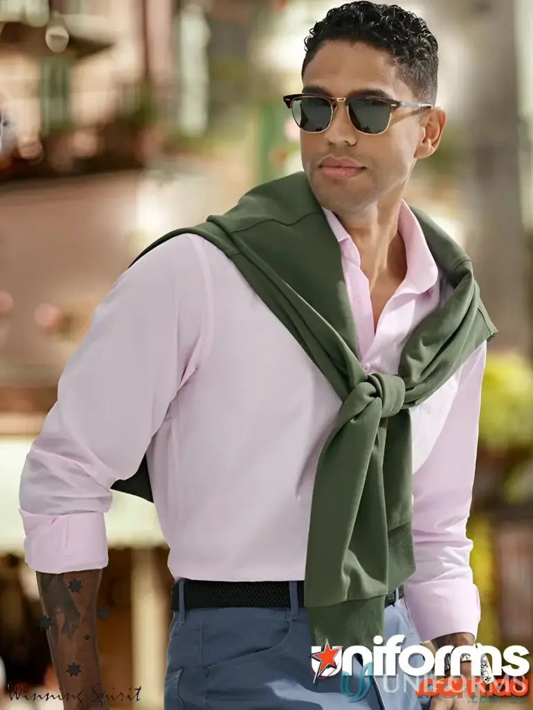 Model wearing olive green airlayed CVC sweater with knit scarf knot perfect for workwear uniforms and work uniforms