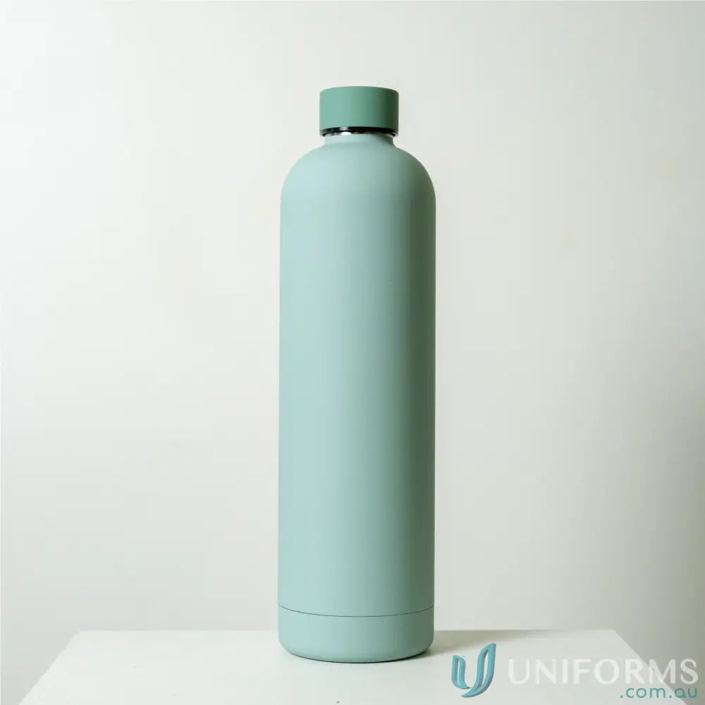 Mint-colored stainless steel Allegra 1L insulated bottle fits in car cup holders with double-wall vacuum
