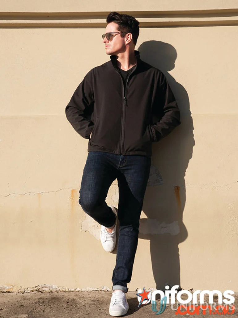 Man wearing Alta Jacket workwear in black, perfect for uniforms and outdoor jobs