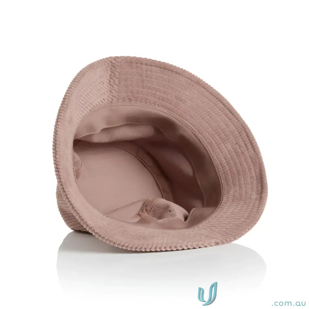 Pink cord bucket hat made from 8-wale partridge cord with soft lining for style and comfort