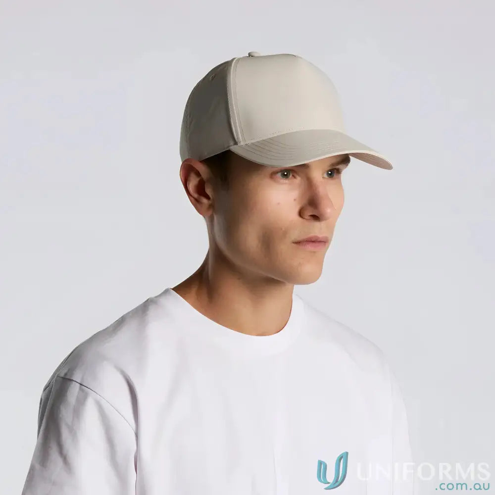 Man in beige Frame Nylon Cap with curved peak and white T-shirt, AS Colour product