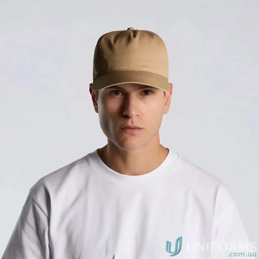 Man in tan flat-top cap with curved peak and plastic adjustable snapback style
