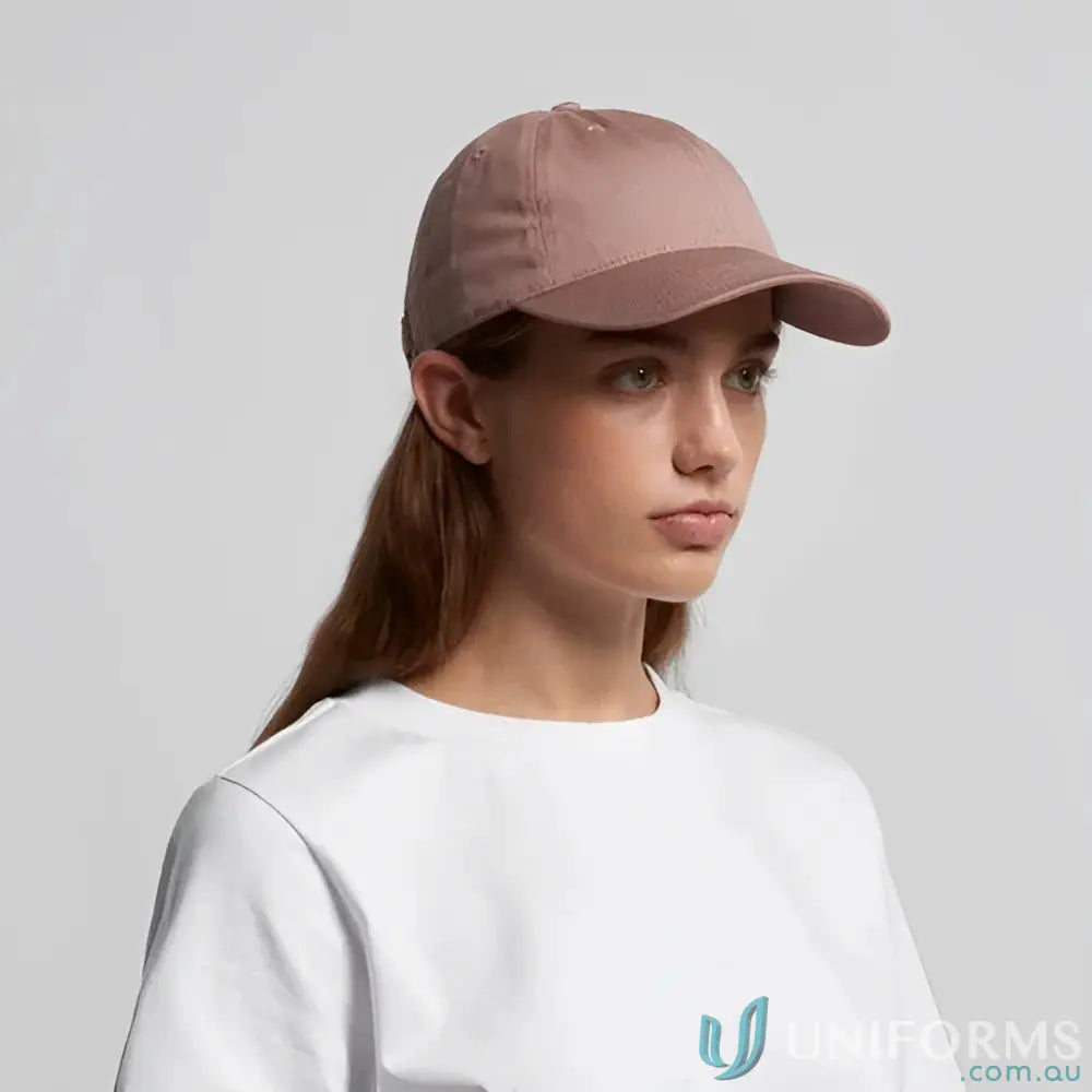 Woman wearing a light brown AS Colour Women’s Access Cap with tonal under-peak lining
