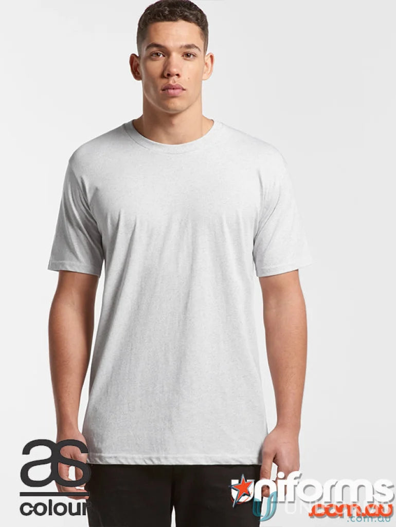 Young man wearing a plain light gray staple marle tee for a casual look