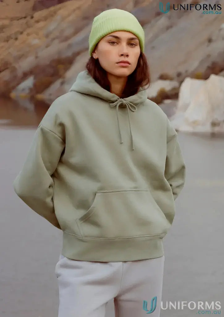 Woman wearing a green oversized heavy weight hoodie and beanie for Womens Heavy Hoodie