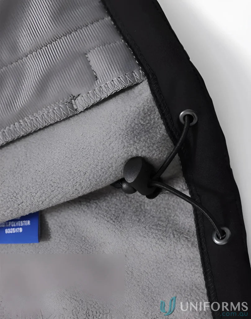 Gray fleece inside of JK33 Aspen softshell hooded jacket with four-way stretch