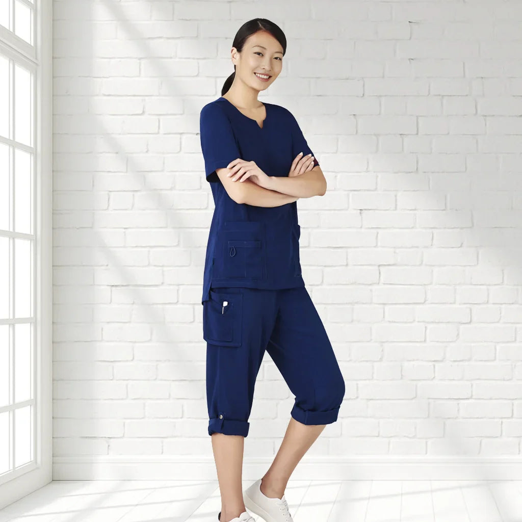 Avery slim leg navy scrub set with cargo pockets and rolled cuffs