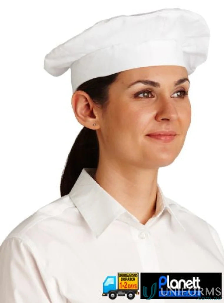White chef’s hat from Bakers Beret, perfect workwear and uniforms for chefs