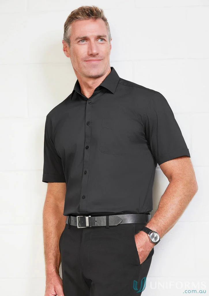 Man in black Bentleigh SS Shirt with modern narrow collar and monaco short style