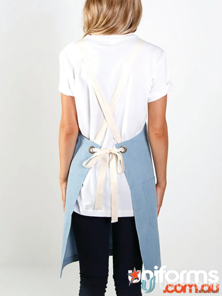 Billy Bib Apron in light blue cotton denim with natural cream-colored straps
