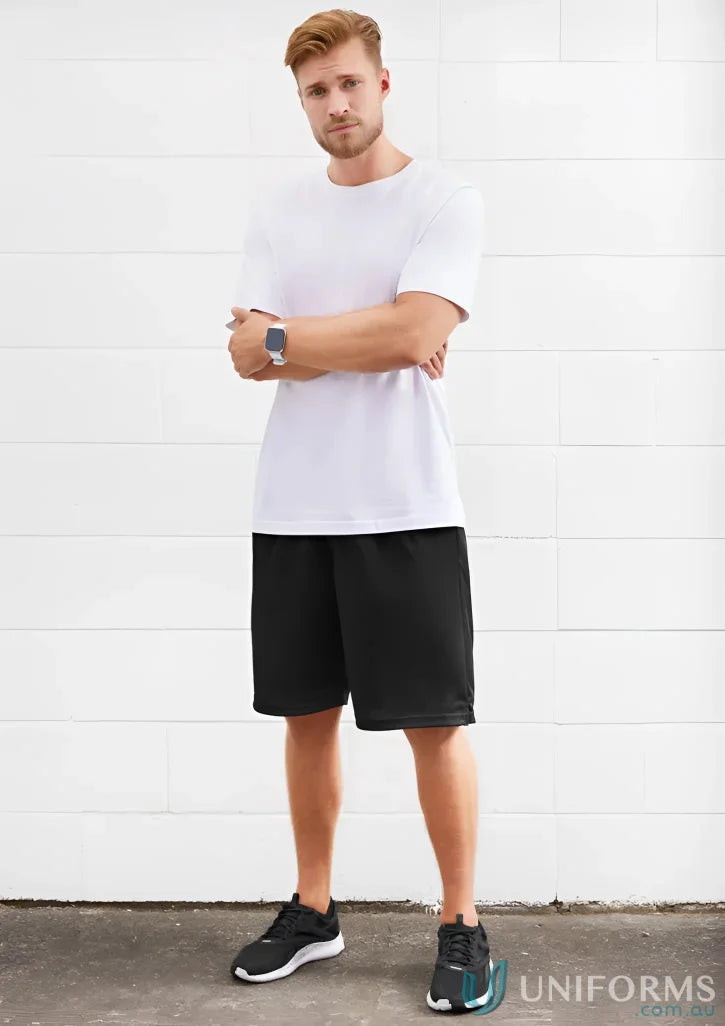 Man in white t-shirt and black Biz Collection Men’s Biz Cool™ Short staying cool