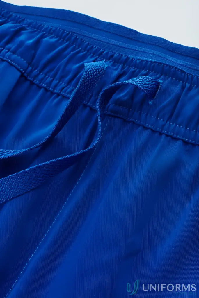 Blue drawstring shorts on Bizcare Avery Slim Leg Scrub Pant for a sleek slim leg scrub look