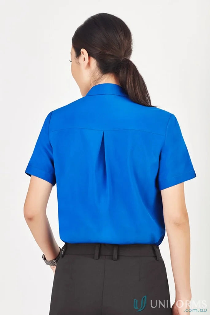 Person from behind wearing Bizcare Women’s Florence CS947LS short-sleeved blue shirt