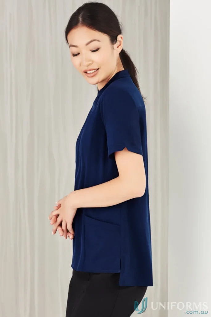 Woman in navy top wearing Bizcare Florence Plain Tunic, women’s Florence plain style CS949LS