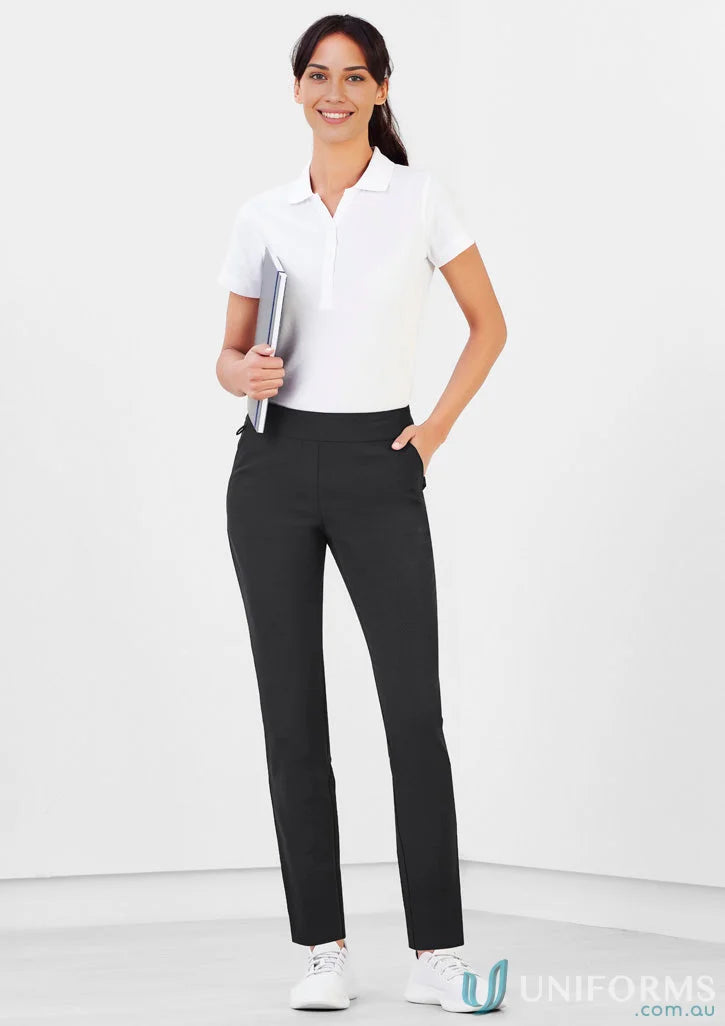Bizcare women’s Jane Stretch Pant: woman in white polo and black pants, casual style