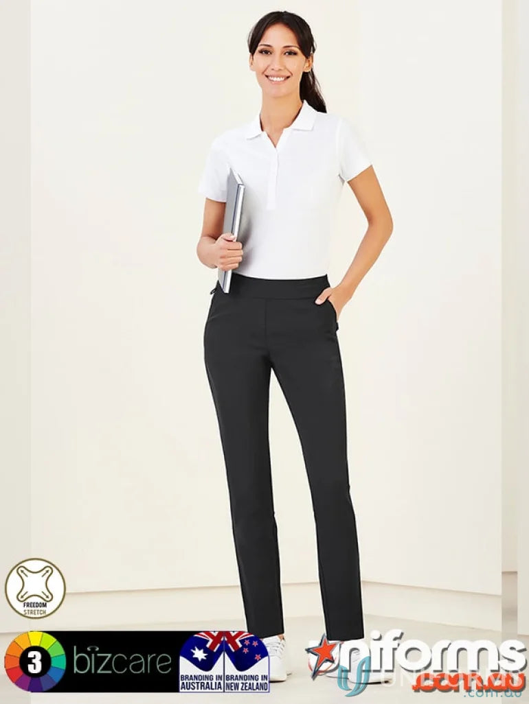 Women wearing Bizcare Jane Stretch Pant in black with white polo shirt, style CL041LL