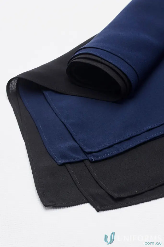 Folded navy blue and black fabric for Bizcare Womens Hijab, stylish women’s hijab accessory