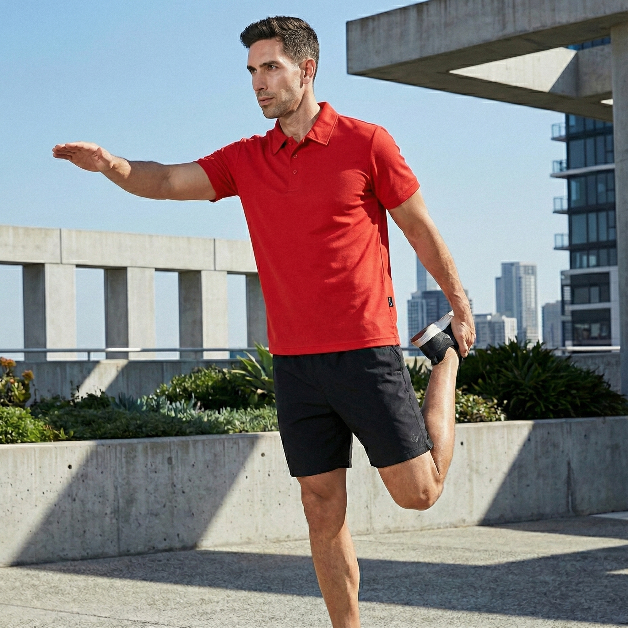 Man in vibrant red Botany Polo shirt, ideal workwear fabric uniform