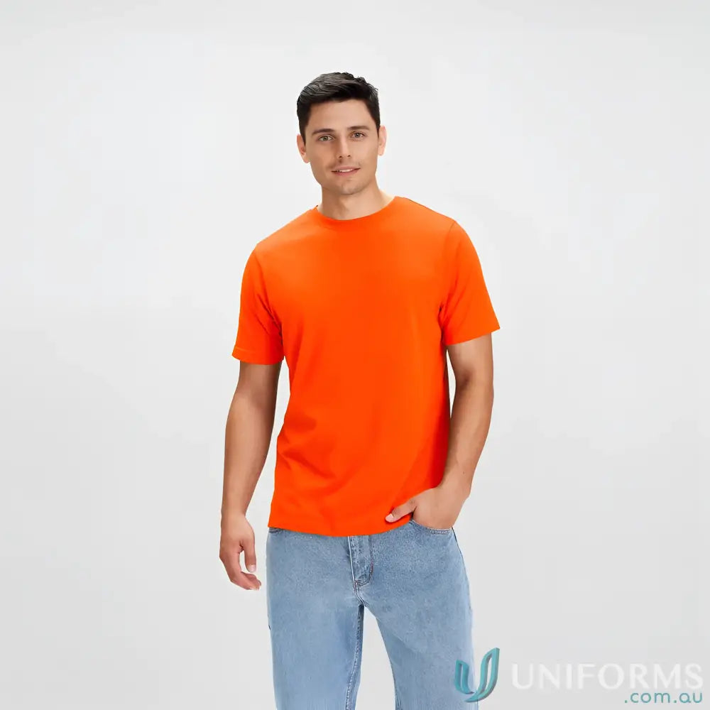 Man in brightport tee ice tee solid orange t-shirt and blue jeans for biz collection