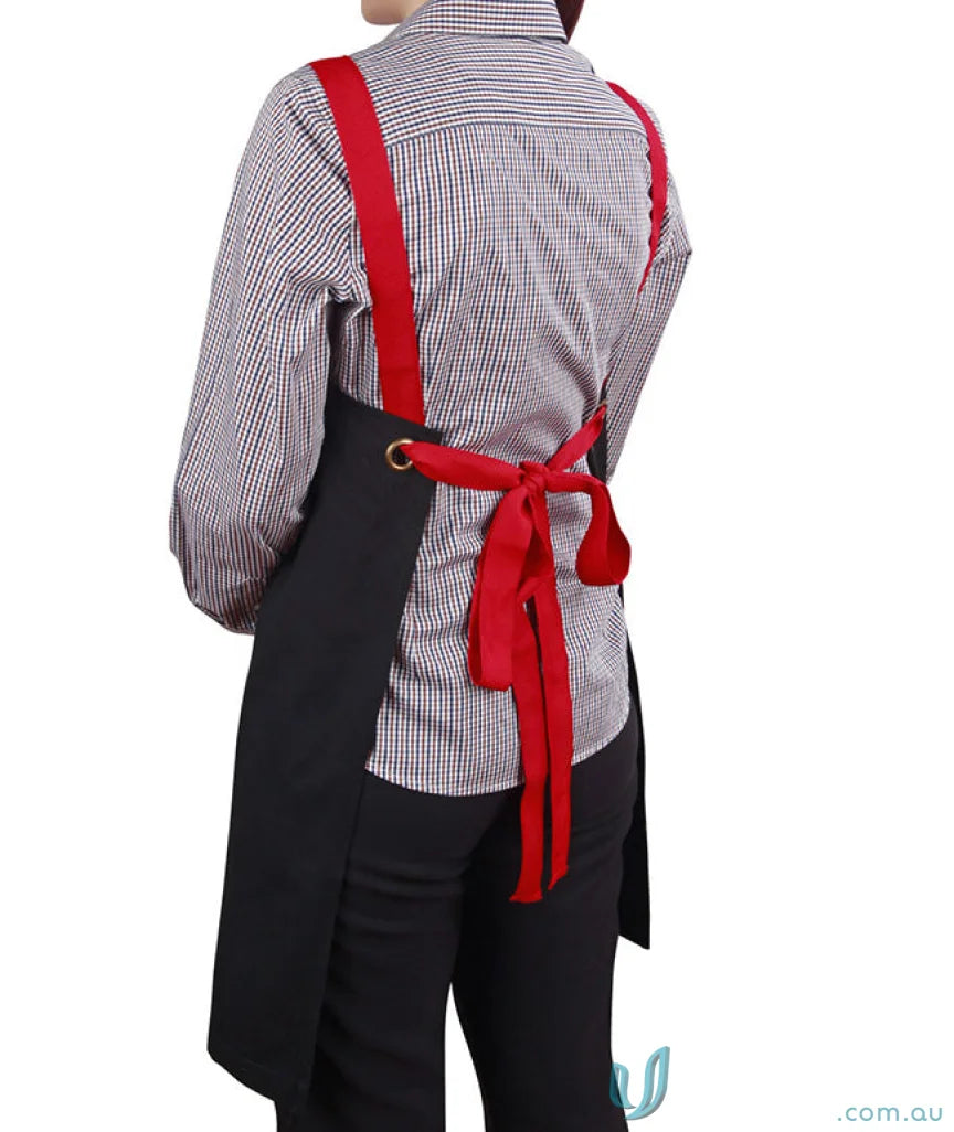 Black apron with red straps from Brunswick Bib Apron collection, perfect for functional workwear