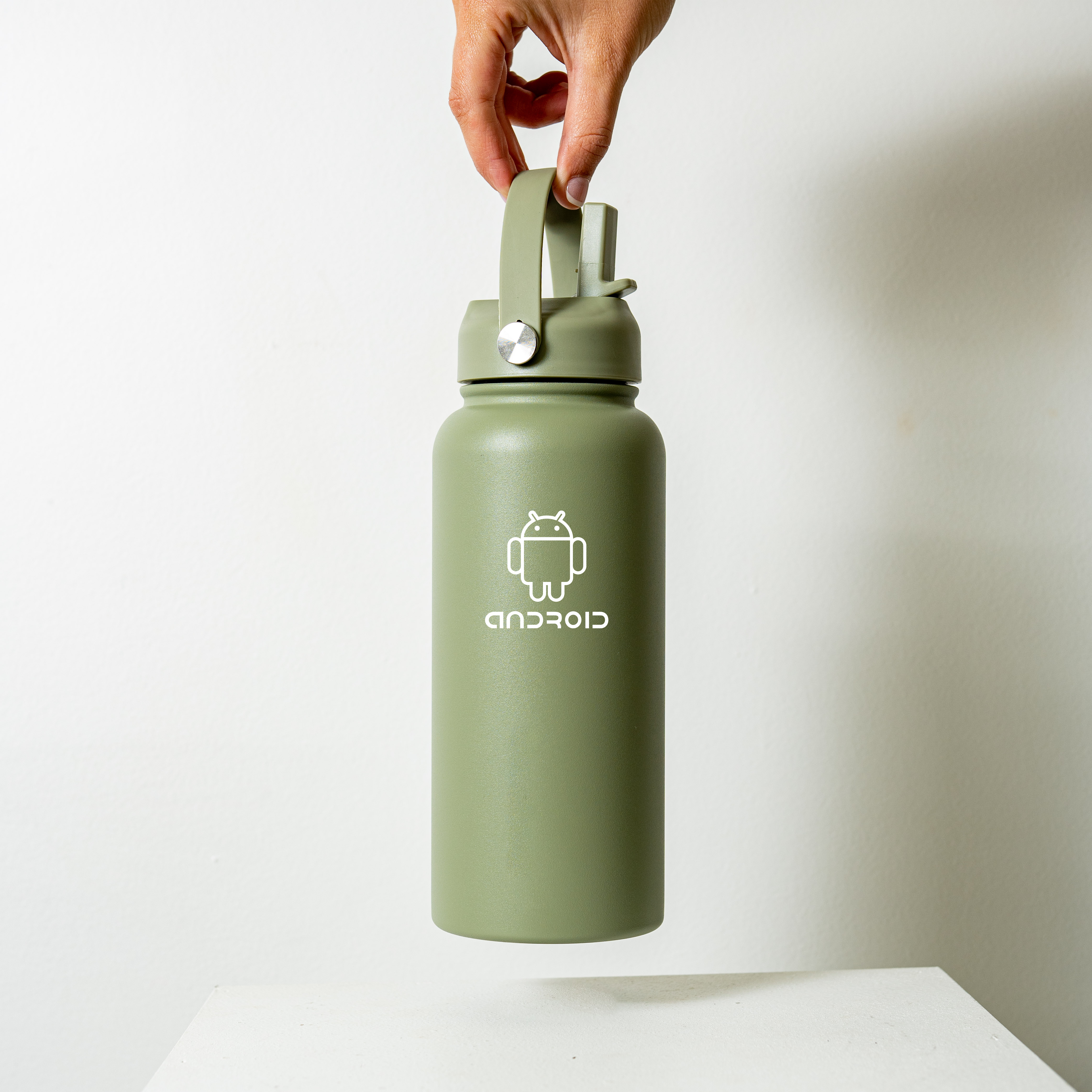 Olive green Byron 1L insulated stainless steel bottle with Android logo, flip-top lid, integrated carry handle and stainless steel straw