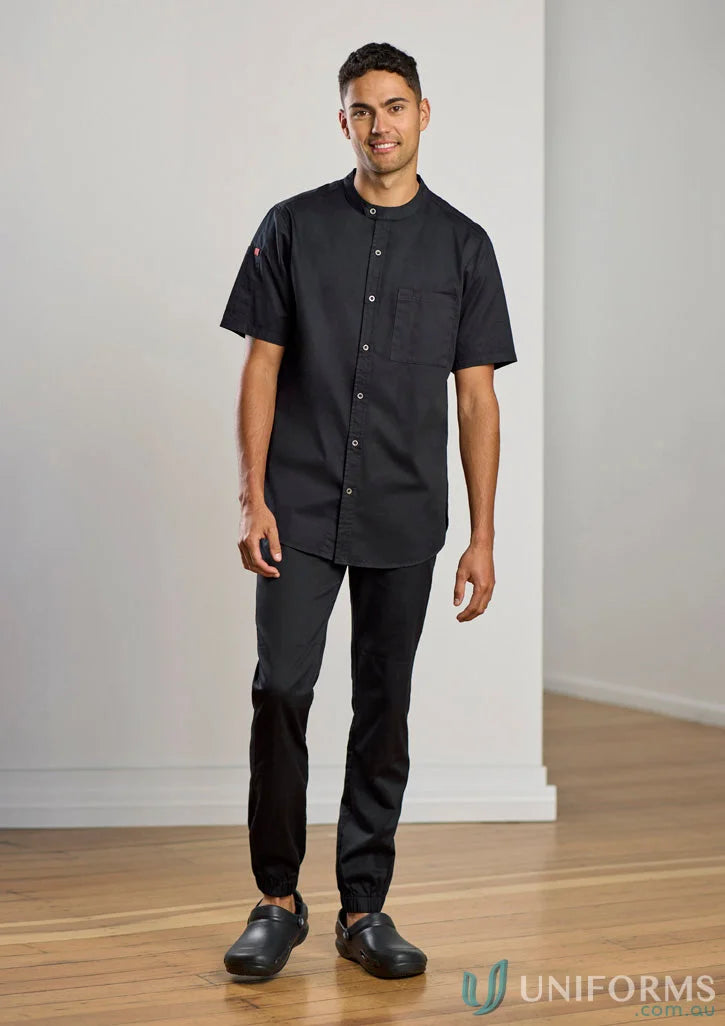 Man in black Cajun Chef Jogger Pant with reinforced knee patches and tapered fit