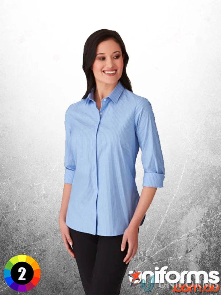 Woman’s light blue striped CC LS Stripe Shirt with button adjustable cuff and long sleeves