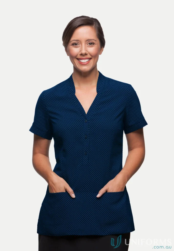 Woman modeling City Collection dark blue workwear scrub top with pockets in City Stretch Spot Tunic