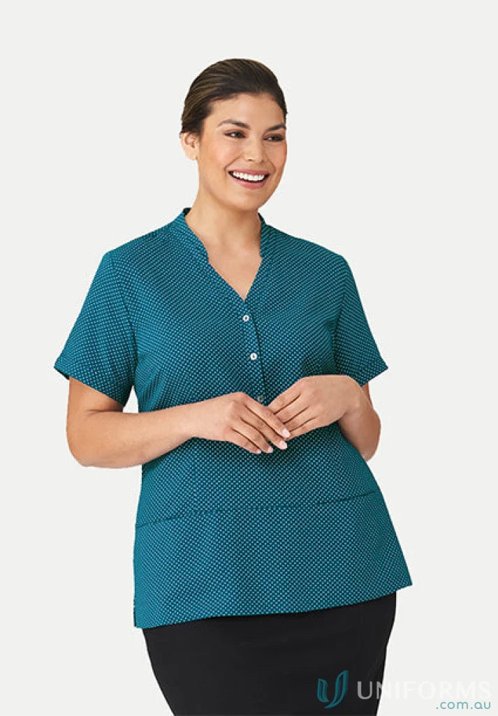 Woman in teal City Collection Spot Tunic and black skirt, perfect workwear style