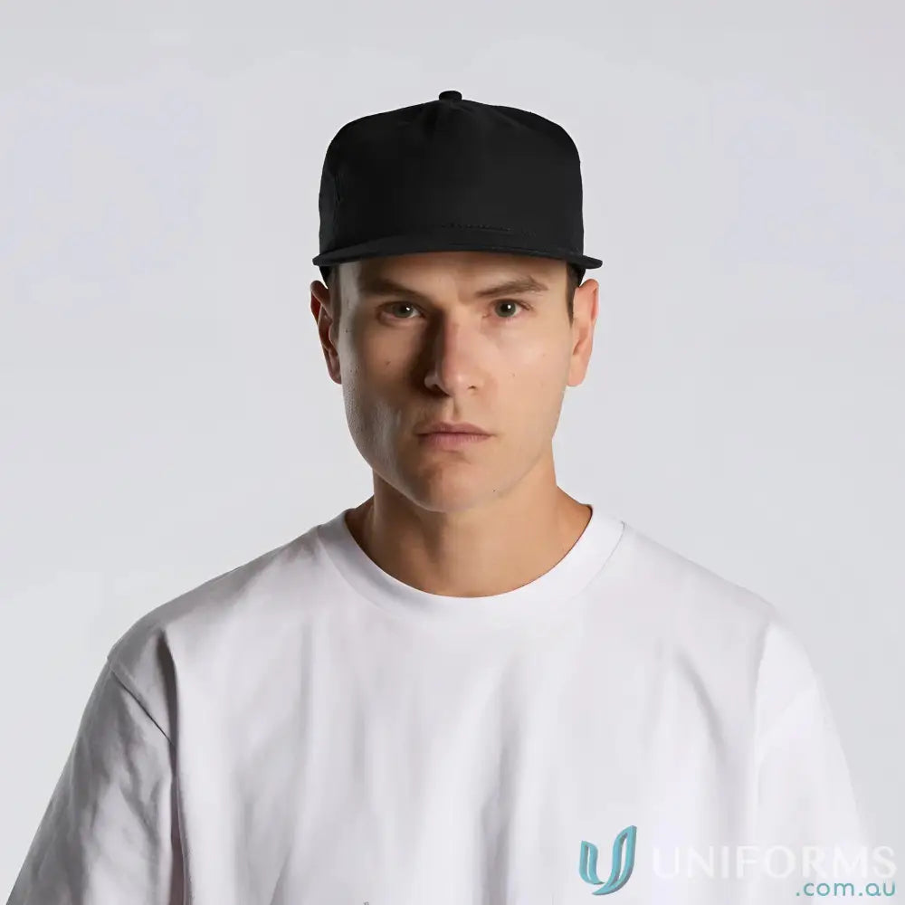 Man in white T-shirt wearing Class Linen Cap with adjustable fastener and tonal under-peak lining
