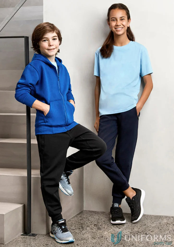 Two kids wearing stylish neo pant tp927k from Biz Collection Kids in athletic gear