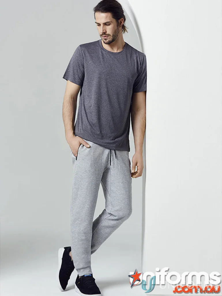 Man in gray T-shirt and sweatpants wearing CLEARANCE Mens Neo Track Pant TP927M from Biz Collection Men’s