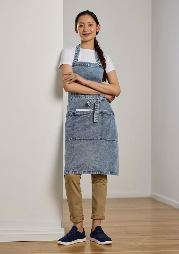 Clout apron in light-wash denim with tied waistband and front pockets