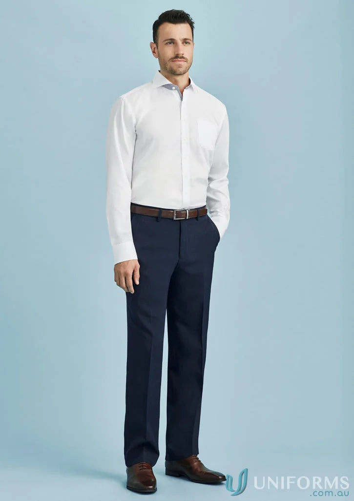 Man in white shirt and navy pants showcasing Cool Stretch Flat Front Pant for stylish workwear
