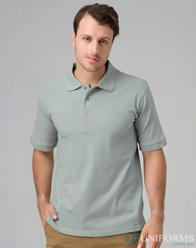 Man in a light green Cotton Stretch Pique Polo shirt, perfect for Darling Harbour adventures