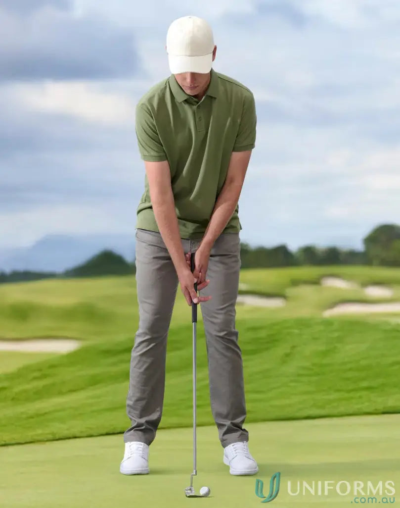 Golfer putting on green wearing a Cotton Twill Unstructured Cap for sun protection and UV shield