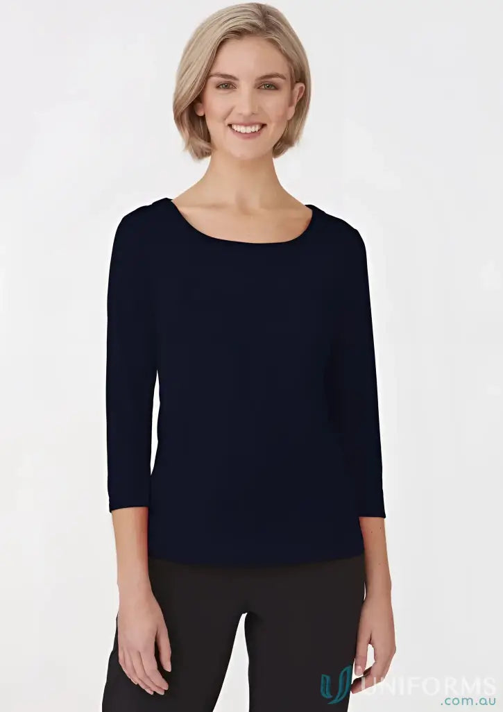 Woman modeling navy blue SmartKnit matte jersey top with three-quarter sleeves