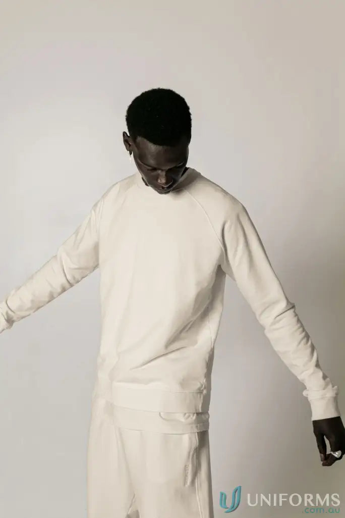 Beige long-sleeved shirt and pants from Archie Crew Sweat for comfy casual look