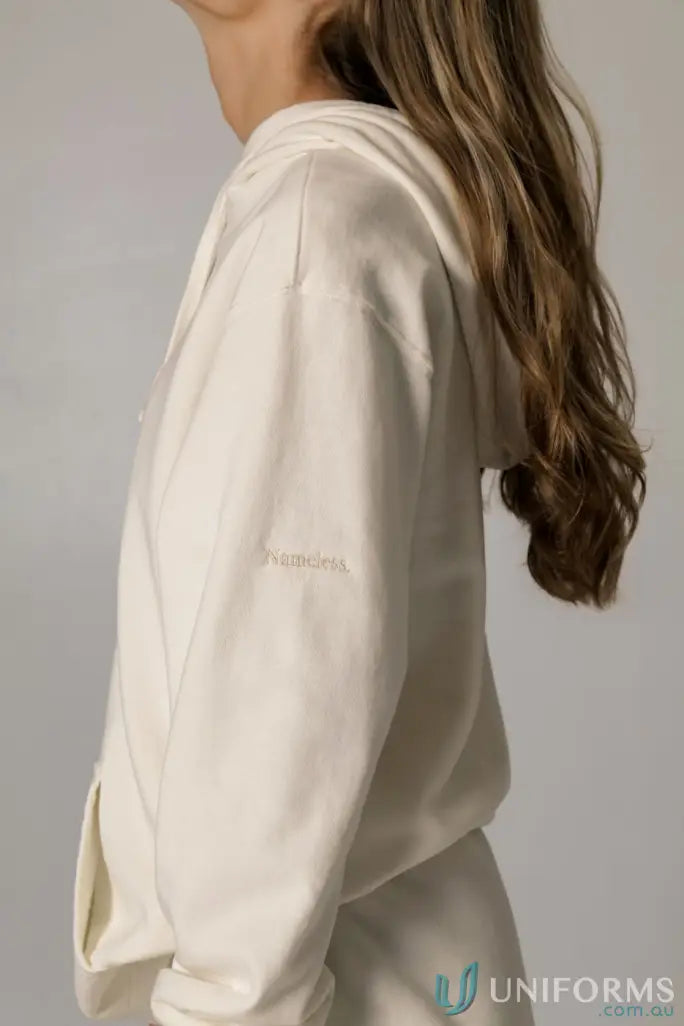 Cream-colored Hudson Oversized Cotton Hoodie with garment dyed look, perfect for uniforms