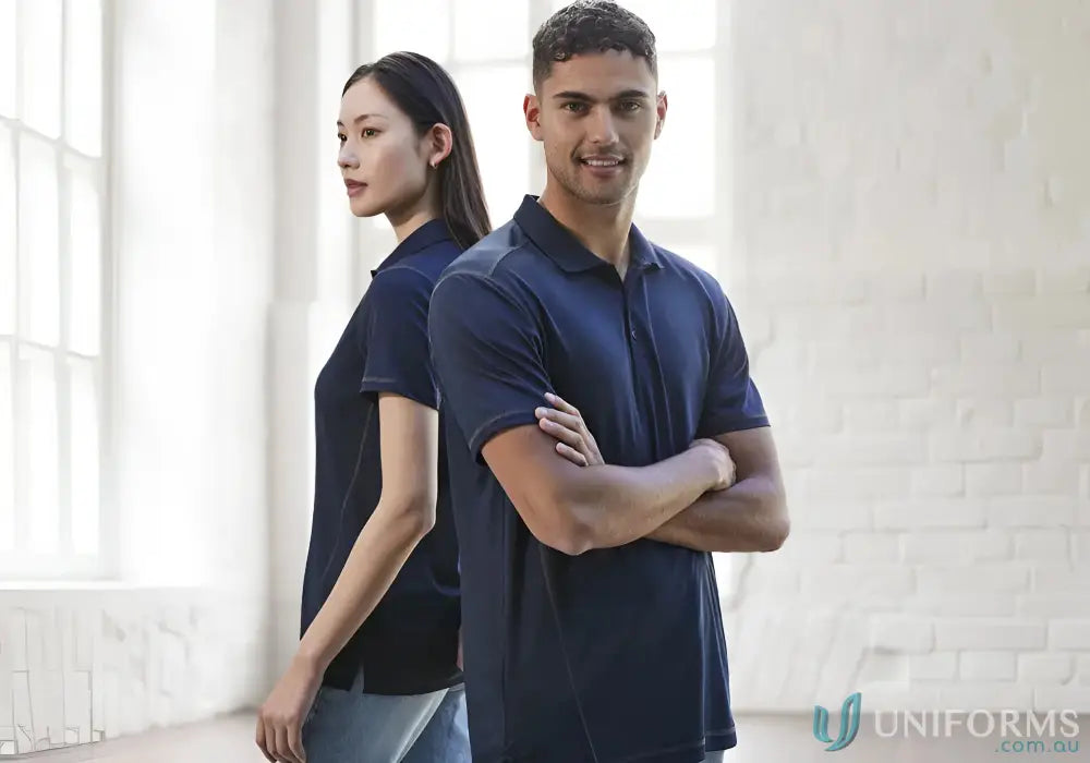 Two people rocking matching navy Dart Short Sleeve Polo shirts from Biz Collection