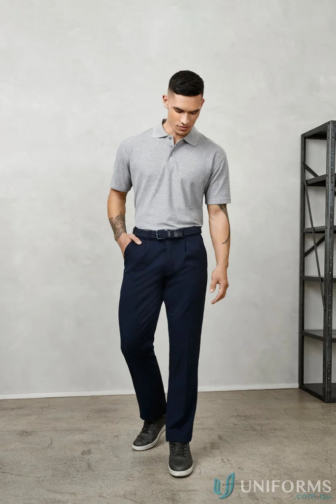 Man wearing Detroit Pant from Biz Collection Men’s B S10110R in gray polo and navy pants