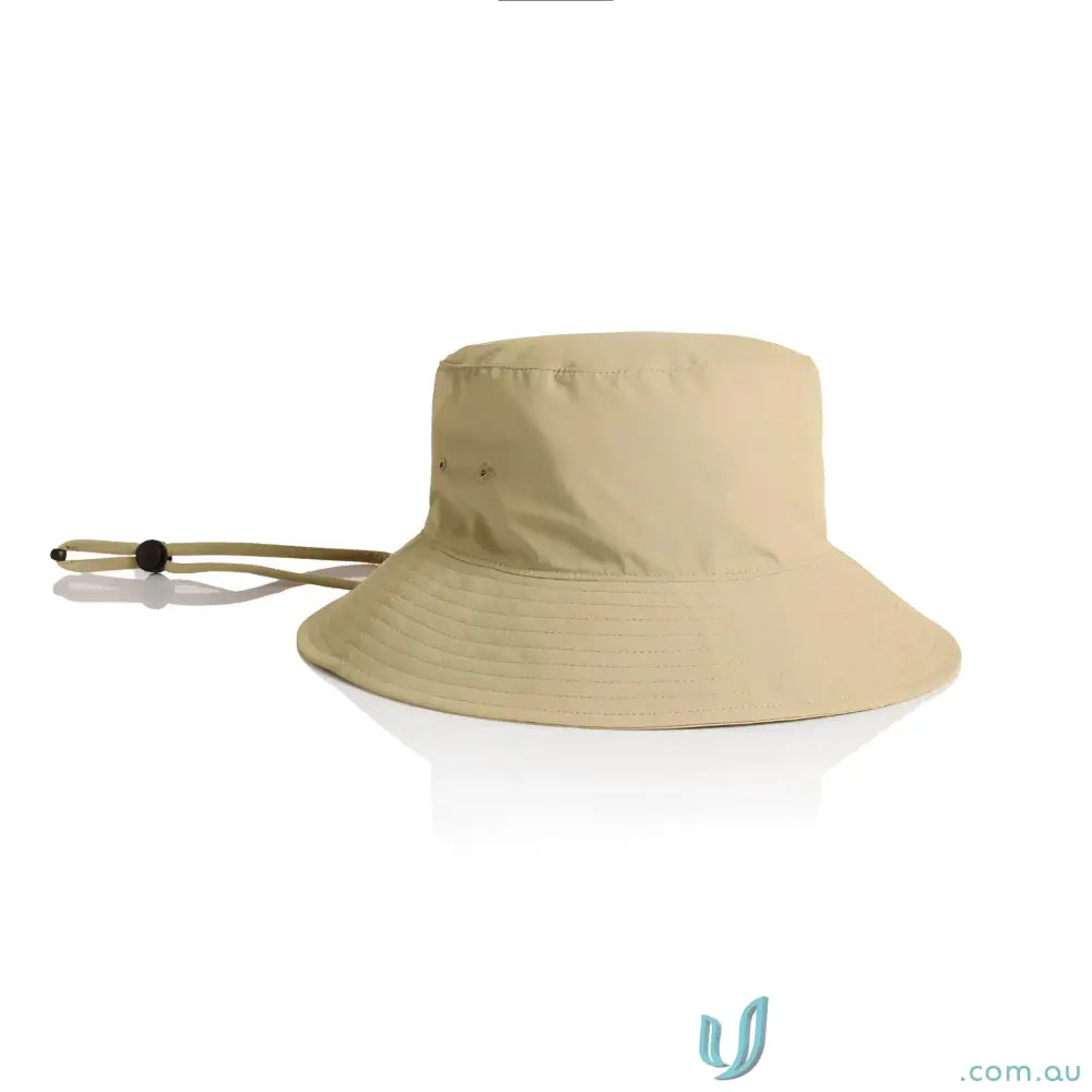 Tan durable nylon wide brim bucket hat with adjustable chin strap for sun protection